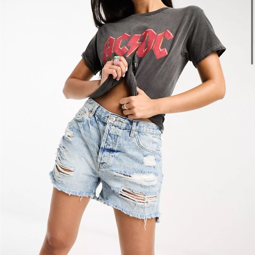 Free people Mid rise denim shorts with rip details